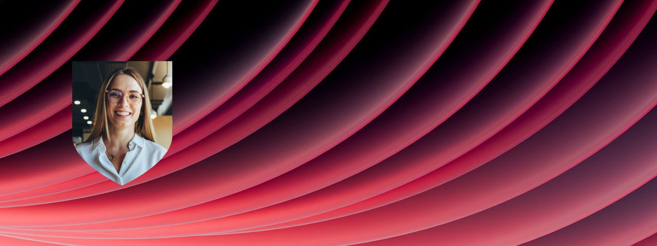 Female student on abstract red waves